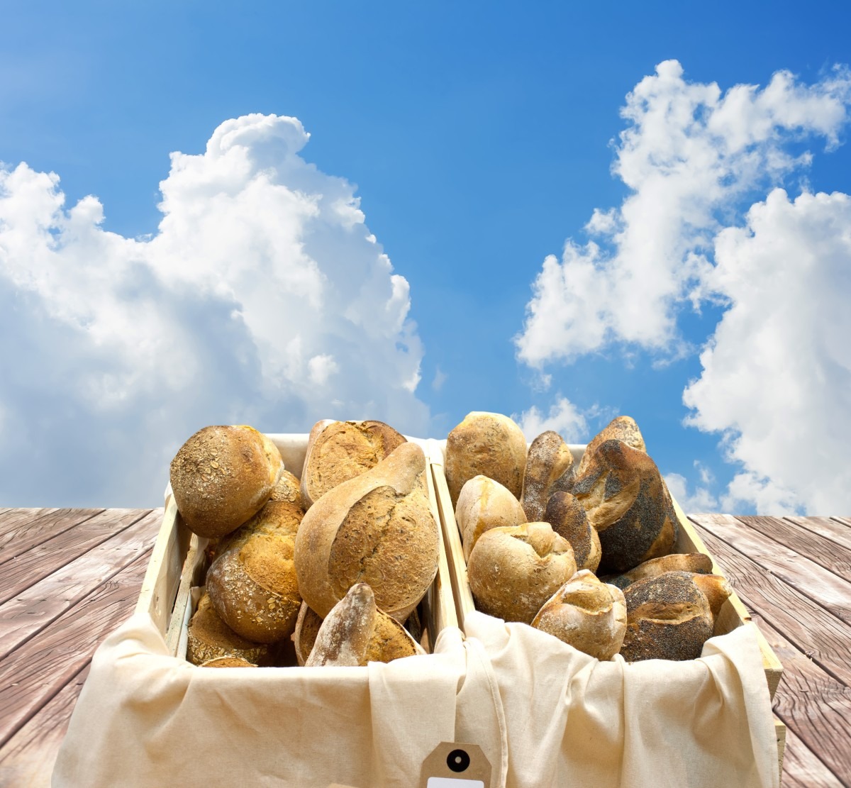 Baskets of loaves of bread raised to the sky: bread from heaven